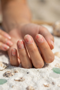 hand-painted-micro-starfish-sheer-nude-nails