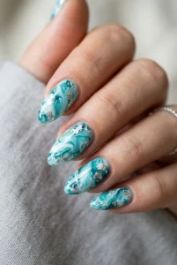 marbled-turquoise-silver-foil-nails
